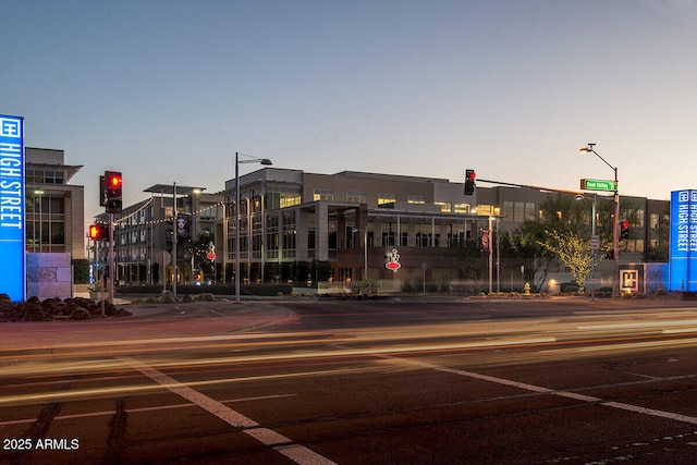 view of outdoor building at dusk