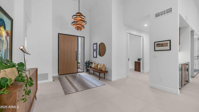 5438 E Lupine Ave, Scottsdale, AZ 85254 - entrance foyer featuring a towering ceiling and baseboards