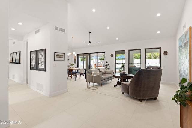 5438 E Lupine Ave, Scottsdale, AZ 85254 - living room featuring recessed lighting, high vaulted ceiling, baseboards, and light tile patterned flooring