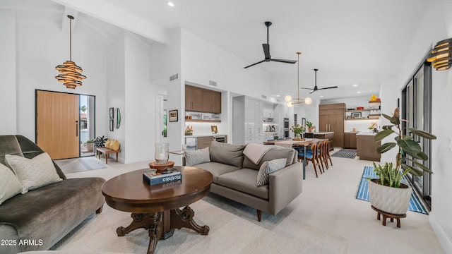 5438 E Lupine Ave, Scottsdale, AZ 85254 - living room featuring high vaulted ceiling, recessed lighting, a chandelier, and a ceiling fan