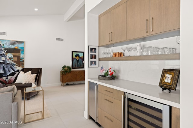 5438 E Lupine Ave, Scottsdale, AZ 85254 - indoor dry bar with beverage cooler, recessed lighting, and baseboards