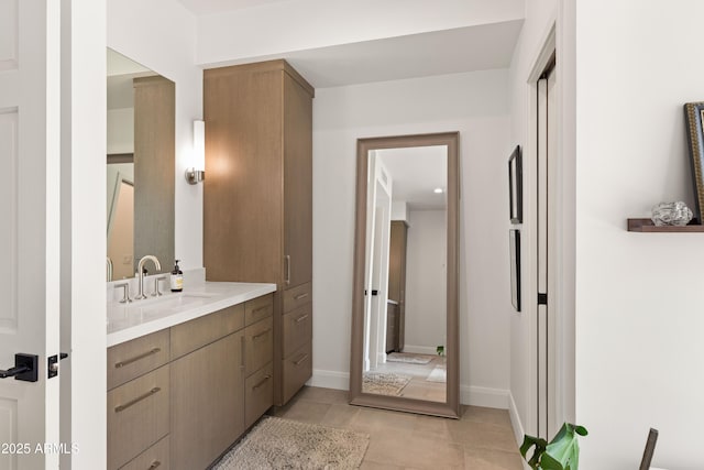 5438 E Lupine Ave, Scottsdale, AZ 85254 - bathroom featuring vanity, tile patterned flooring, and baseboards
