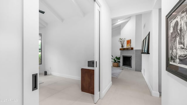 5438 E Lupine Ave, Scottsdale, AZ 85254 - hallway featuring light tile patterned floors, beamed ceiling, and baseboards