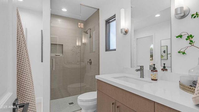 5438 E Lupine Ave, Scottsdale, AZ 85254 - bathroom with a shower stall, toilet, vanity, and recessed lighting