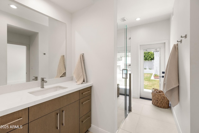 5438 E Lupine Ave, Scottsdale, AZ 85254 - full bathroom featuring baseboards, vanity, tile patterned flooring, a shower stall, and recessed lighting