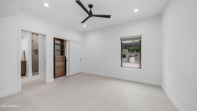 5438 E Lupine Ave, Scottsdale, AZ 85254 - unfurnished bedroom featuring recessed lighting, baseboards, tile patterned floors, and a closet