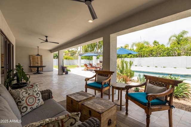 5438 E Lupine Ave, Scottsdale, AZ 85254 - fenced backyard with ceiling fan, an outdoor hangout area, a patio, and outdoor dining area