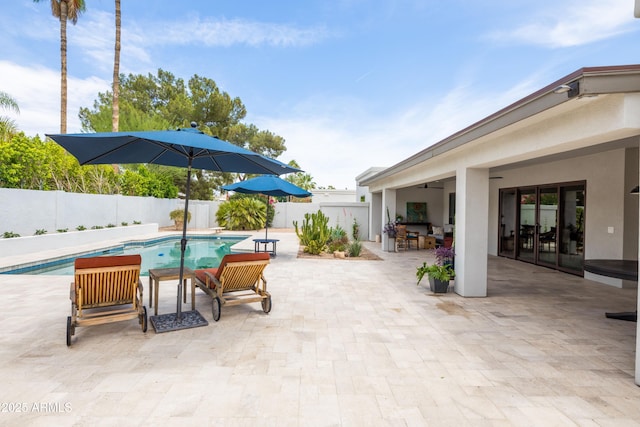 5438 E Lupine Ave, Scottsdale, AZ 85254 - view of swimming pool featuring a fenced backyard, a patio area, and a ceiling fan