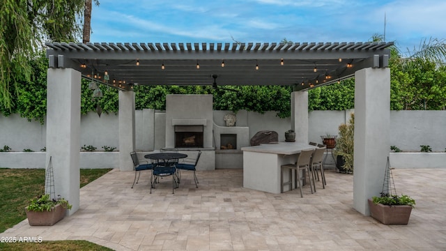 5438 E Lupine Ave, Scottsdale, AZ 85254 - view of patio featuring an outdoor fireplace and a pergola