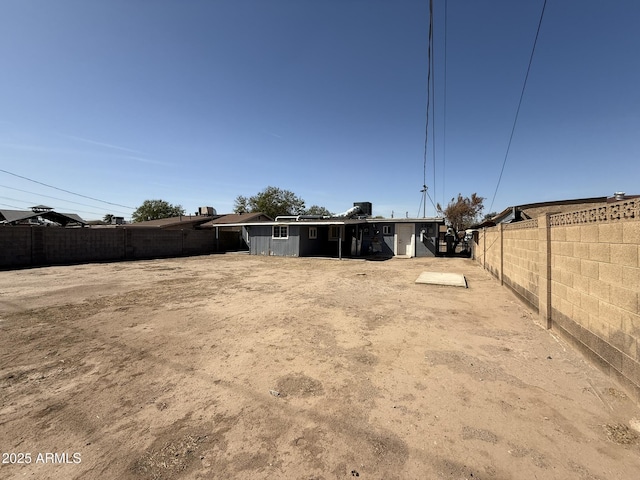 view of yard featuring a fenced backyard