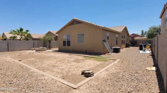 4432 W Pleasant Ln, Laveen, AZ 85339 - rear view of house with a tile roof, a fenced backyard, stucco siding, and cooling unit