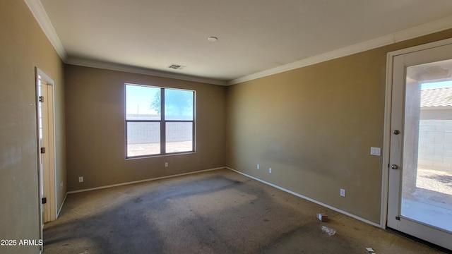 4432 W Pleasant Ln, Laveen, AZ 85339 - carpeted empty room featuring crown molding, healthy amount of natural light, and baseboards