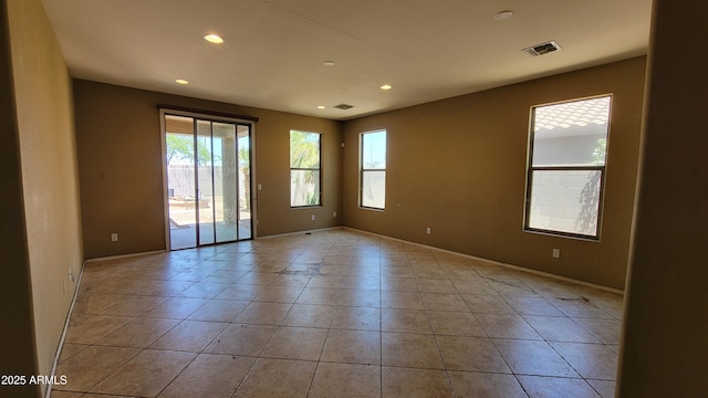 4432 W Pleasant Ln, Laveen, AZ 85339 - tiled empty room with recessed lighting and baseboards