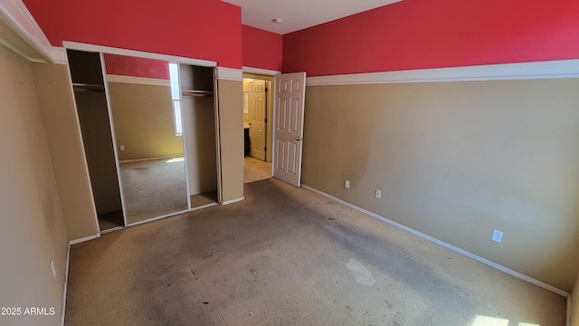 4432 W Pleasant Ln, Laveen, AZ 85339 - unfurnished bedroom with carpet floors, a closet, and baseboards