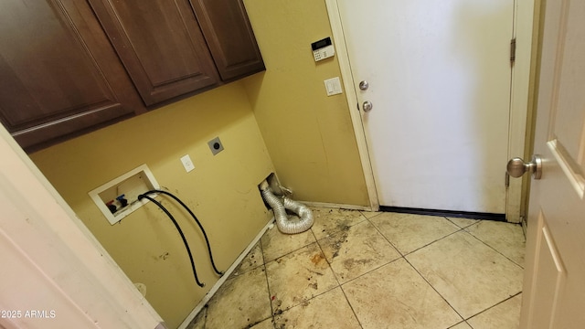 4432 W Pleasant Ln, Laveen, AZ 85339 - laundry area featuring cabinet space, hookup for an electric dryer, washer hookup, and light tile patterned flooring
