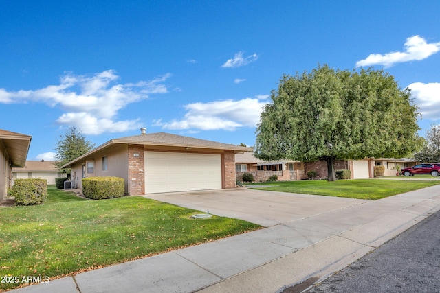 ranch-style home featuring central AC, a front yard, and a garage