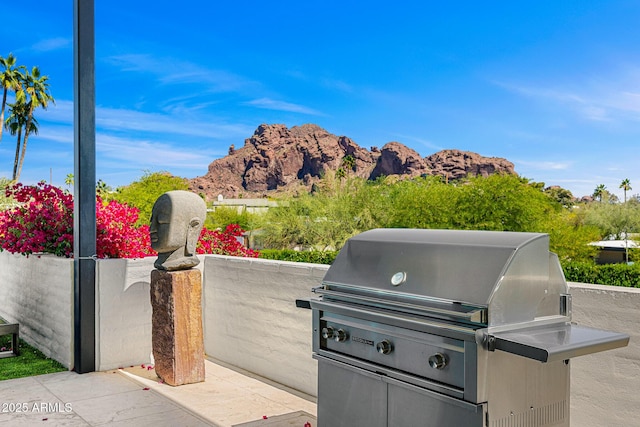 4218 E Palo Verde Dr, Phoenix, AZ 85018 - view of patio with a grill and a mountain view