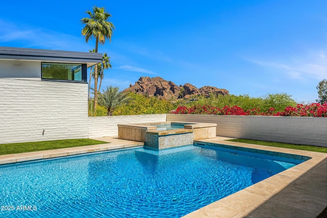 4218 E Palo Verde Dr, Phoenix, AZ 85018 - view of pool with an in ground hot tub, a fenced in pool, and a mountain view