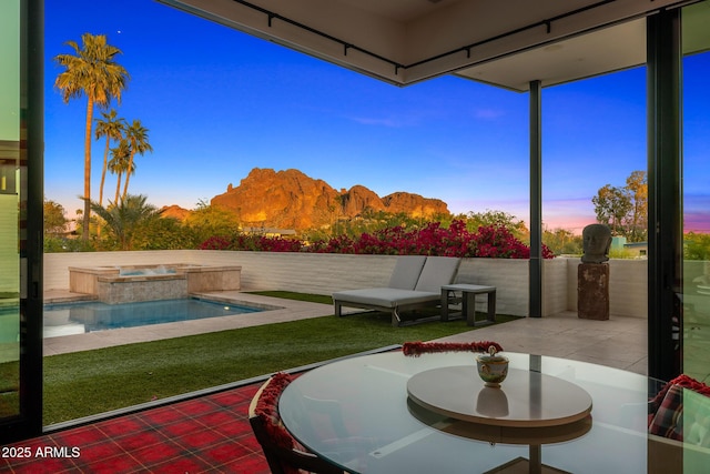 4218 E Palo Verde Dr, Phoenix, AZ 85018 - view of patio / terrace with a pool with connected hot tub