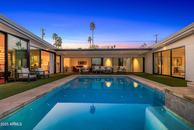 4218 E Palo Verde Dr, Phoenix, AZ 85018 - pool at dusk with a patio, an outdoor pool, and outdoor lounge area