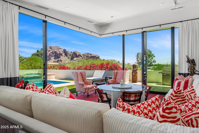 4218 E Palo Verde Dr, Phoenix, AZ 85018 - sunroom featuring a mountain view and visible vents