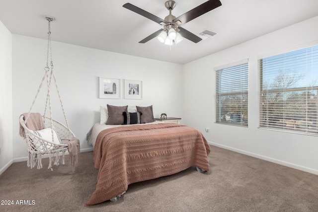 bedroom featuring ceiling fan and carpet floors