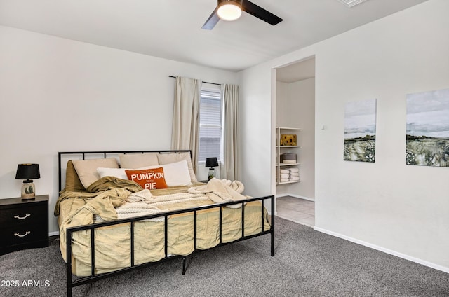 bedroom with baseboards, carpet, ceiling fan, and tile patterned flooring