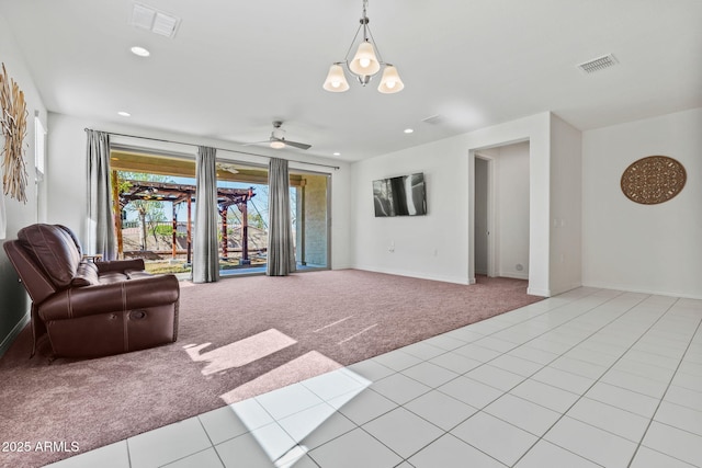 living room with light carpet, light tile patterned floors, visible vents, and recessed lighting