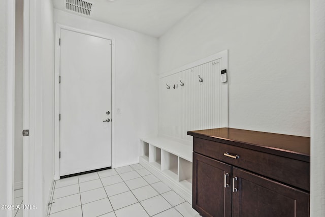 mudroom featuring light tile patterned floors and visible vents