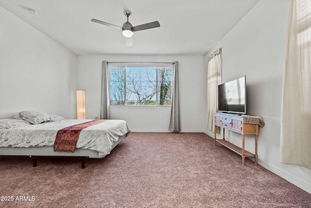 bedroom featuring carpet, baseboards, and ceiling fan