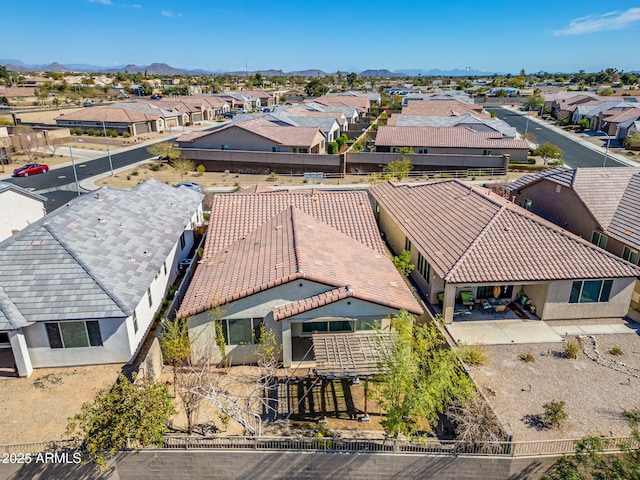 birds eye view of property featuring a residential view and a mountain view