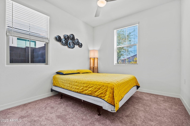 bedroom featuring carpet, a ceiling fan, and baseboards