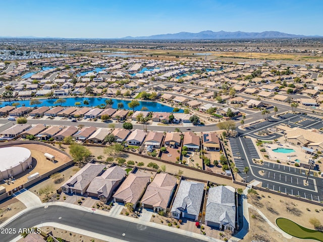 birds eye view of property featuring a mountain view and a residential view