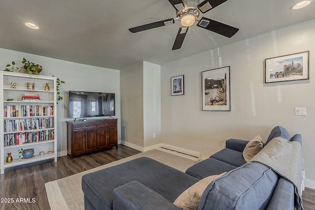 living area with baseboards, a ceiling fan, wood finished floors, and recessed lighting