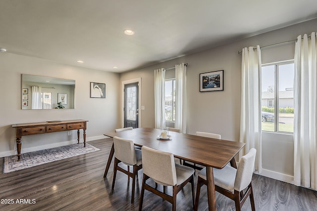 dining space with plenty of natural light, recessed lighting, baseboards, and dark wood-type flooring