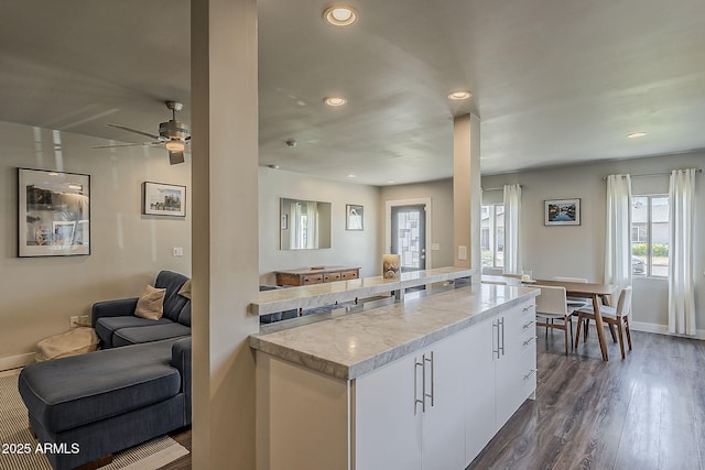 kitchen with open floor plan, ceiling fan, dark wood-style floors, recessed lighting, and white cabinets