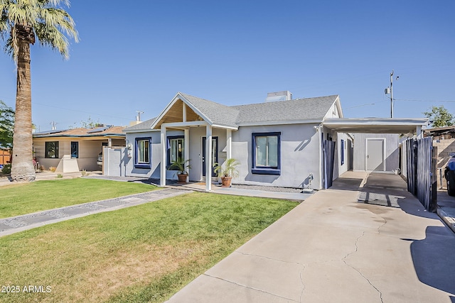 ranch-style home featuring a front lawn, stucco siding, a chimney, a shingled roof, and a carport