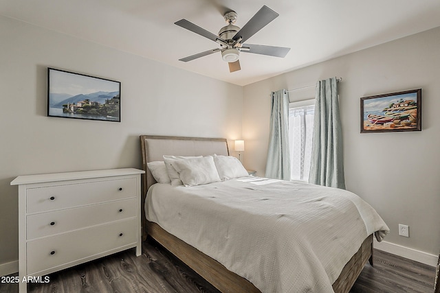 bedroom with baseboards, a ceiling fan, and dark wood-style floors