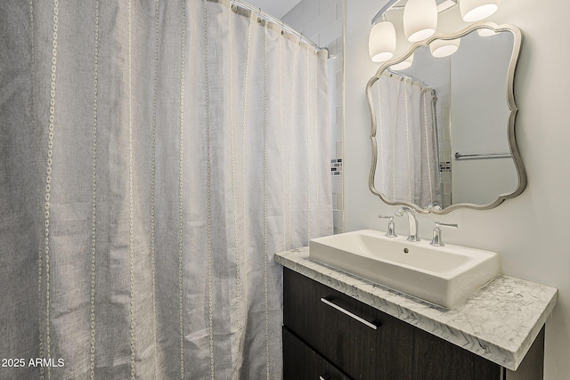 full bathroom featuring a sink