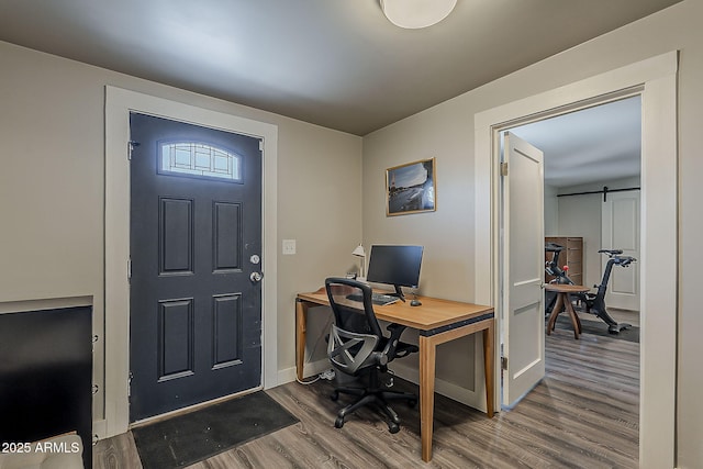 office with baseboards and wood finished floors