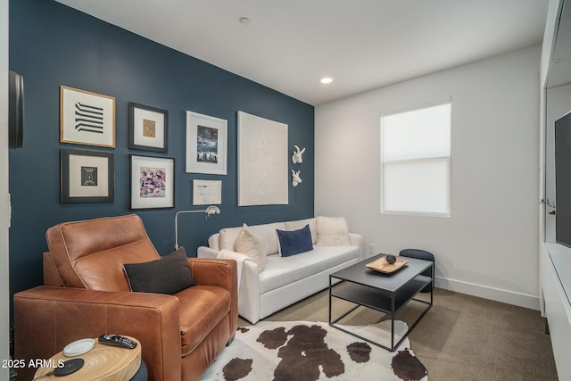 living room with baseboards, recessed lighting, and carpet