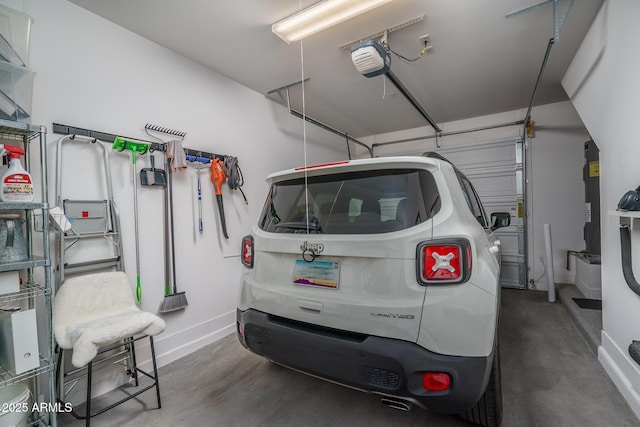 garage featuring baseboards and a garage door opener