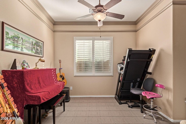 office area with ceiling fan, baseboards, light carpet, and ornamental molding