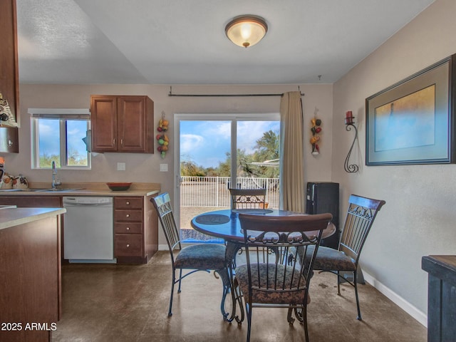 dining space with baseboards