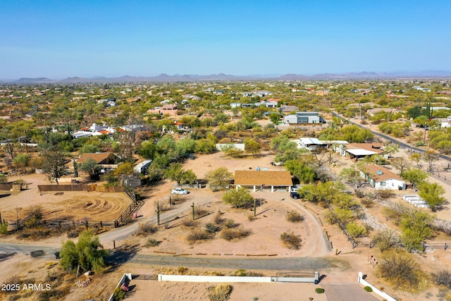 drone / aerial view featuring a mountain view