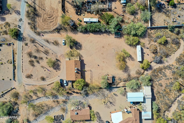 birds eye view of property with view of desert