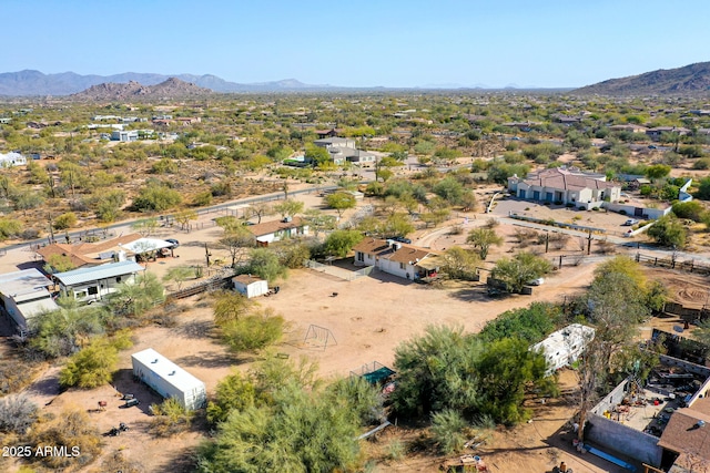 birds eye view of property featuring a mountain view