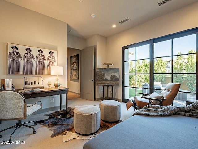 bedroom with carpet floors, recessed lighting, visible vents, and baseboards