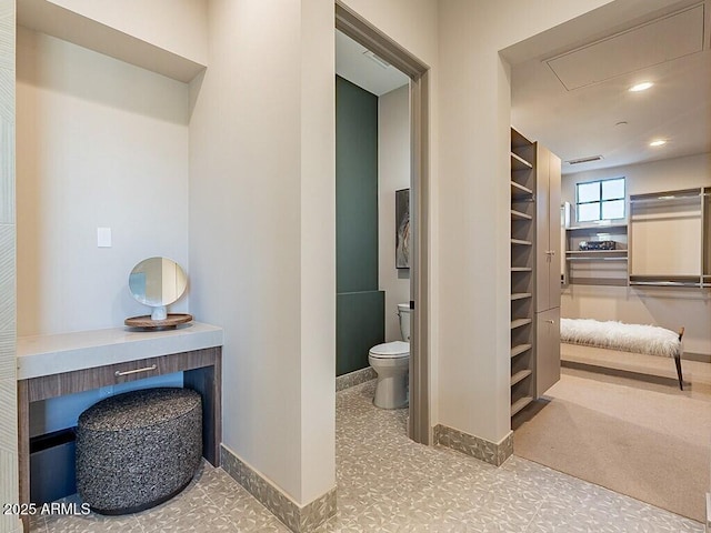 bathroom with visible vents, recessed lighting, toilet, and baseboards