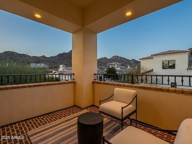 balcony featuring a mountain view